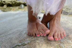 Our toes in the sand at Kennedy's 1st birthday party.  1st time having her toes painted! <3